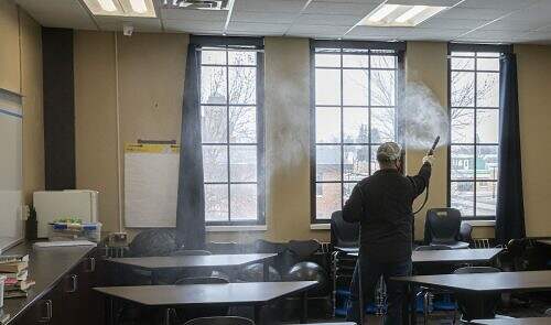 electrostatic disinfecting sprayer in classroom